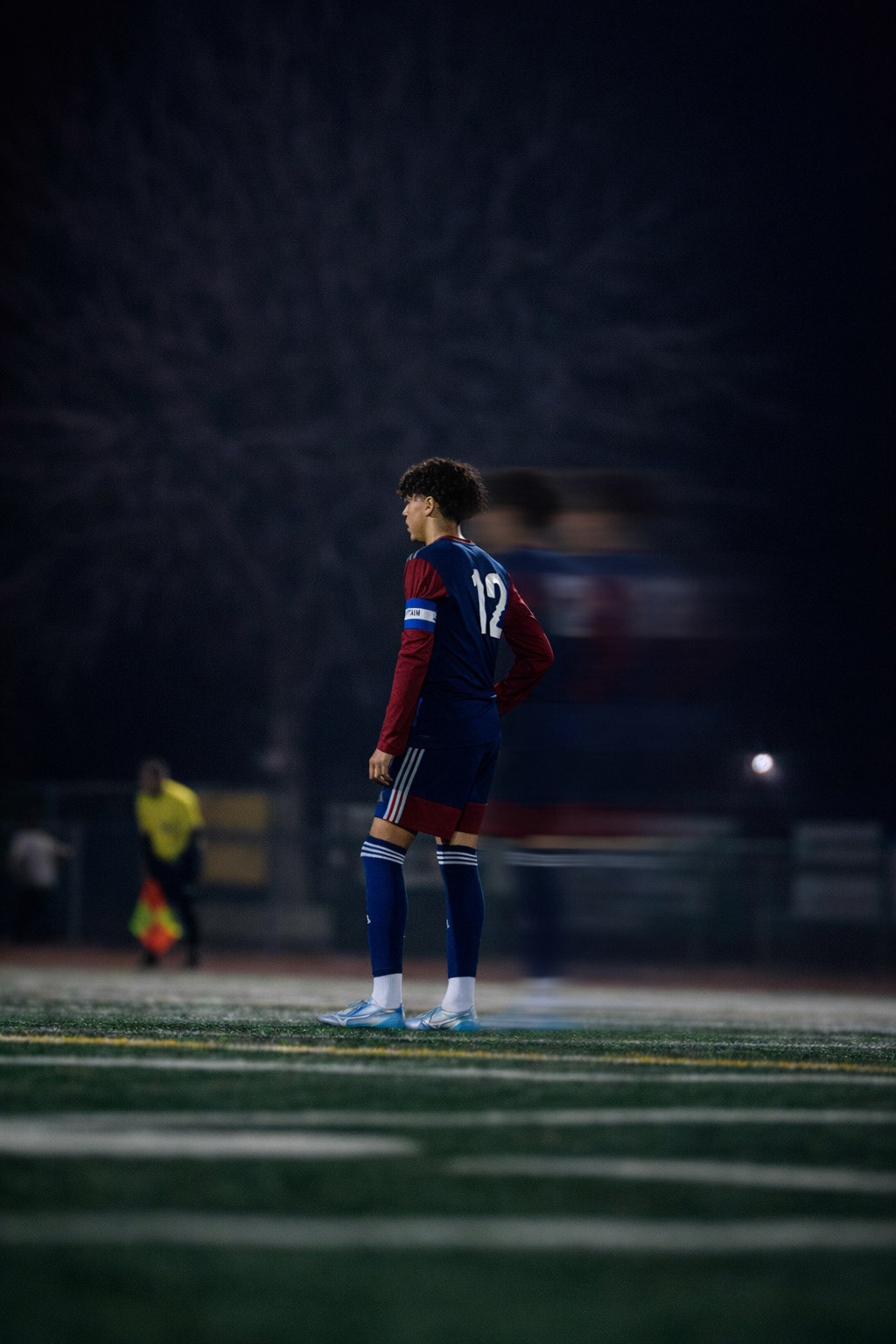 Soccer player standing tall