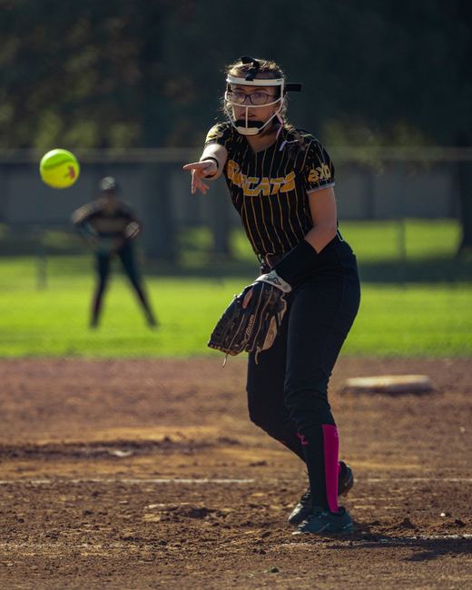 Softball pitcher mid delivery