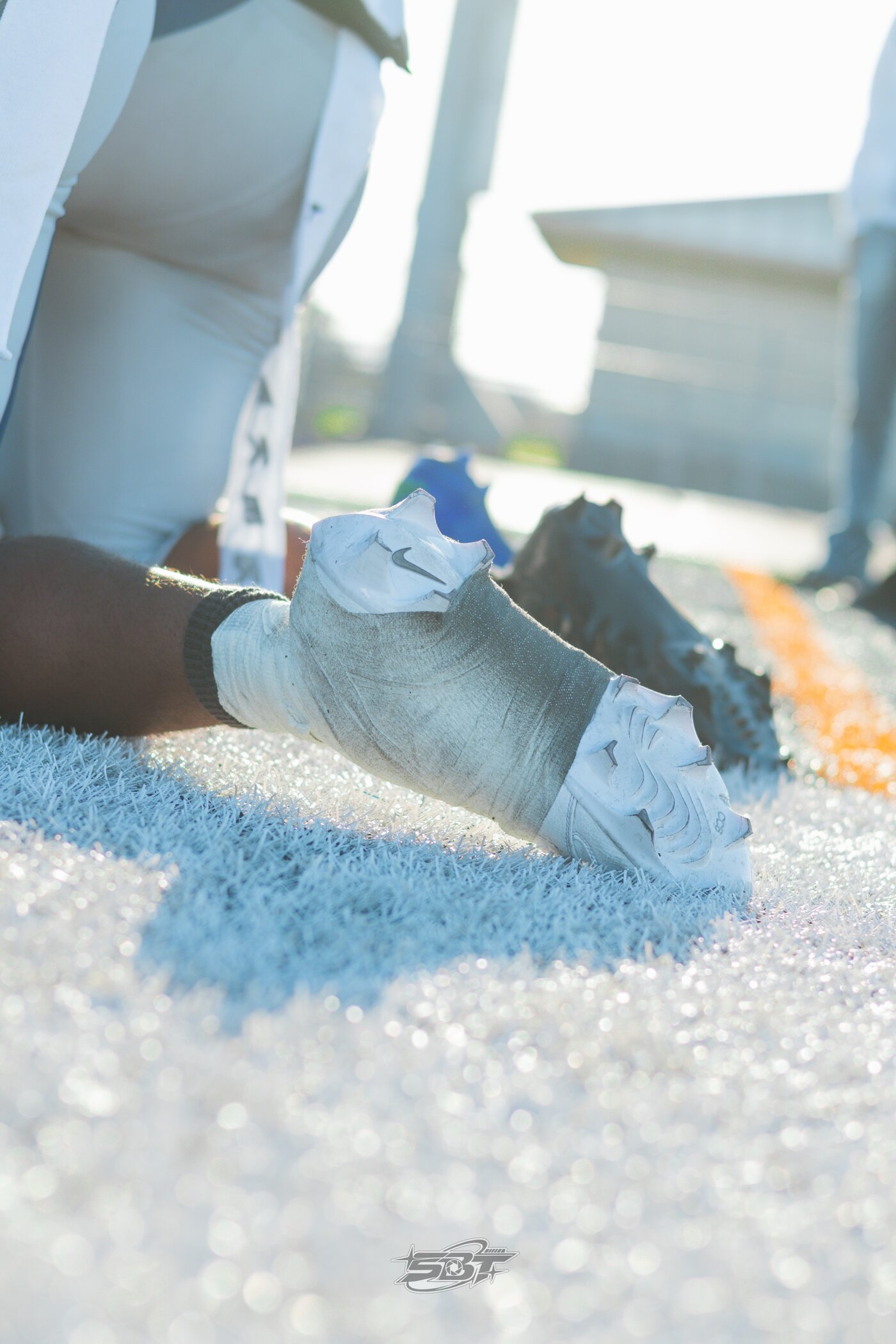 Close up of cleats on the turf