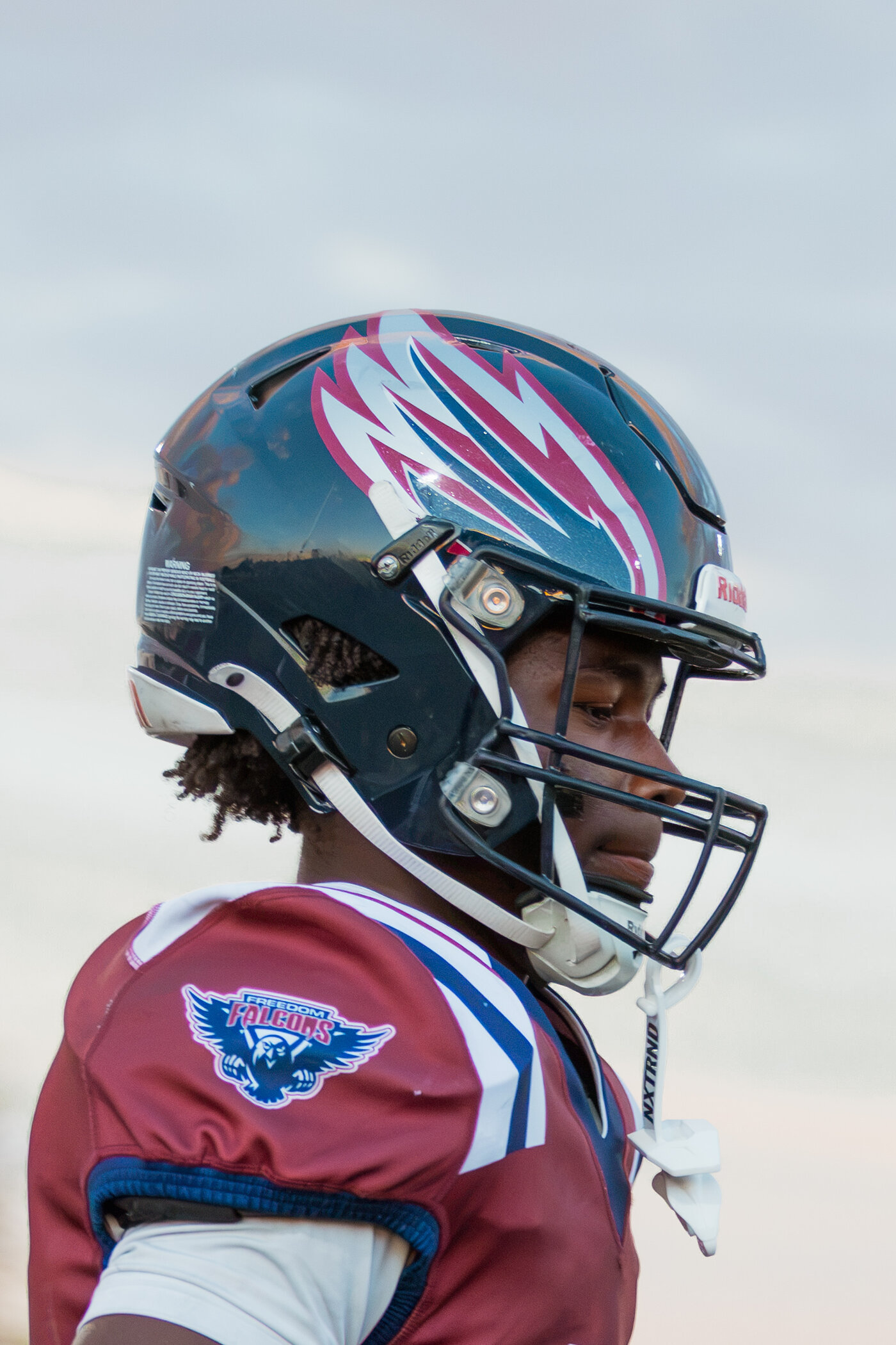 Close up side profile of a player in helmet