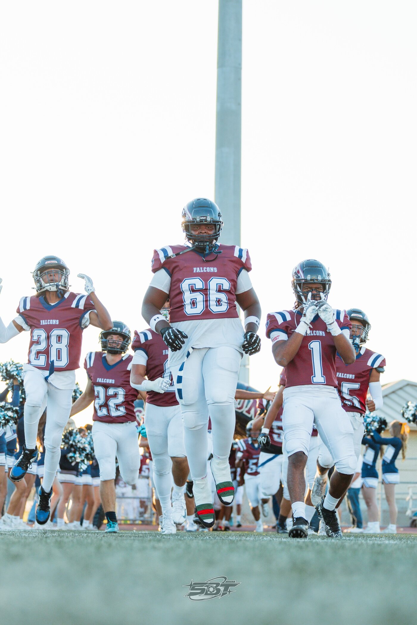 Team running onto the field