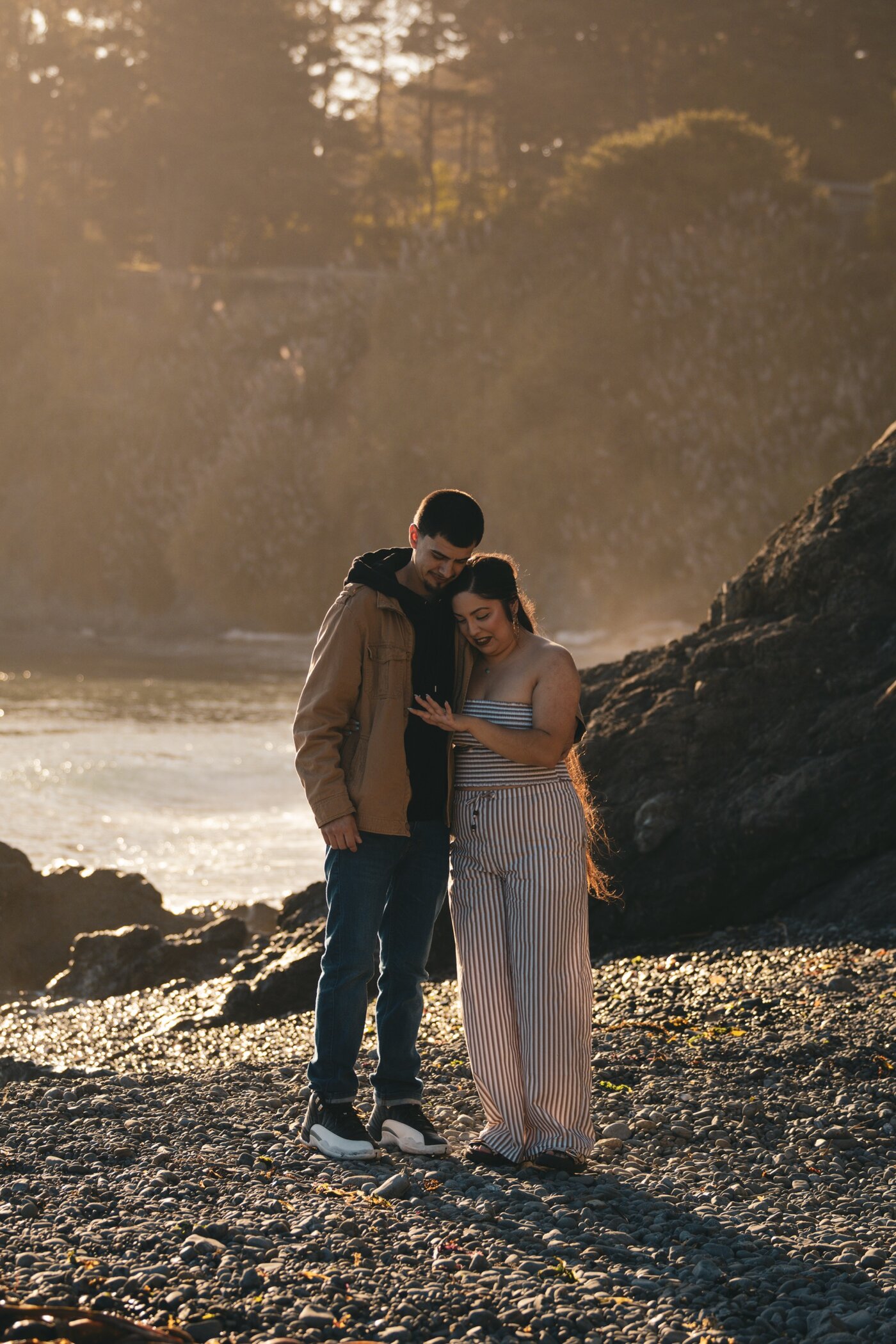 Couple looking at engagement ring